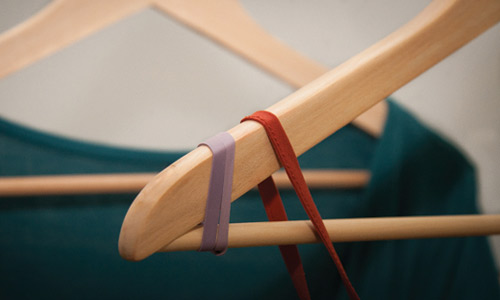 rubber band on the ends of your hangers